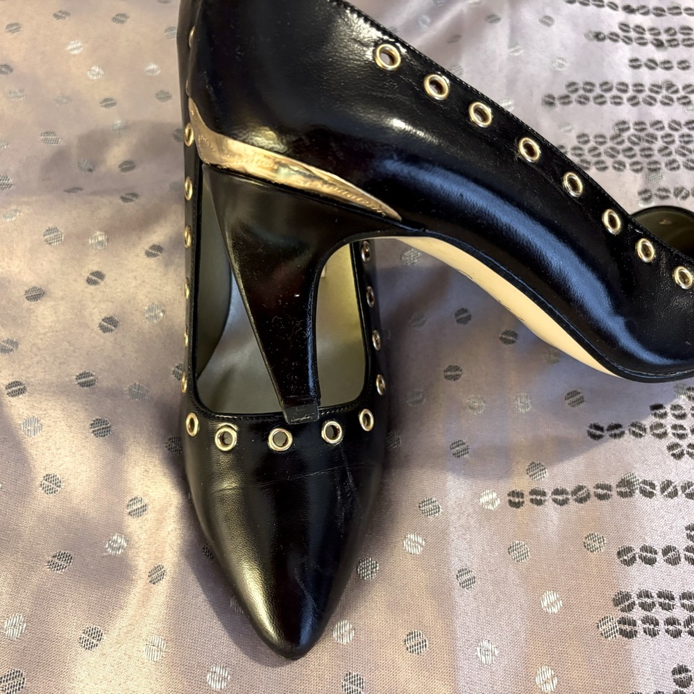Beautiful Proxy black heels with gold accents size 5-1/2. Almost new condition.